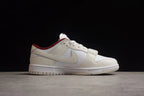 Side profile showing the low-top silhouette, off-white overlays, white side panel, and red collar lining.