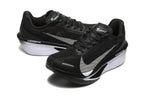 Pair of black Nike Zoom Fly 6 shoes with light-colored swooshes and white midsole sections