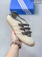 Side view of a cream and brown perforated adidas Anfu trainer showing the three front straps and textured outsole.