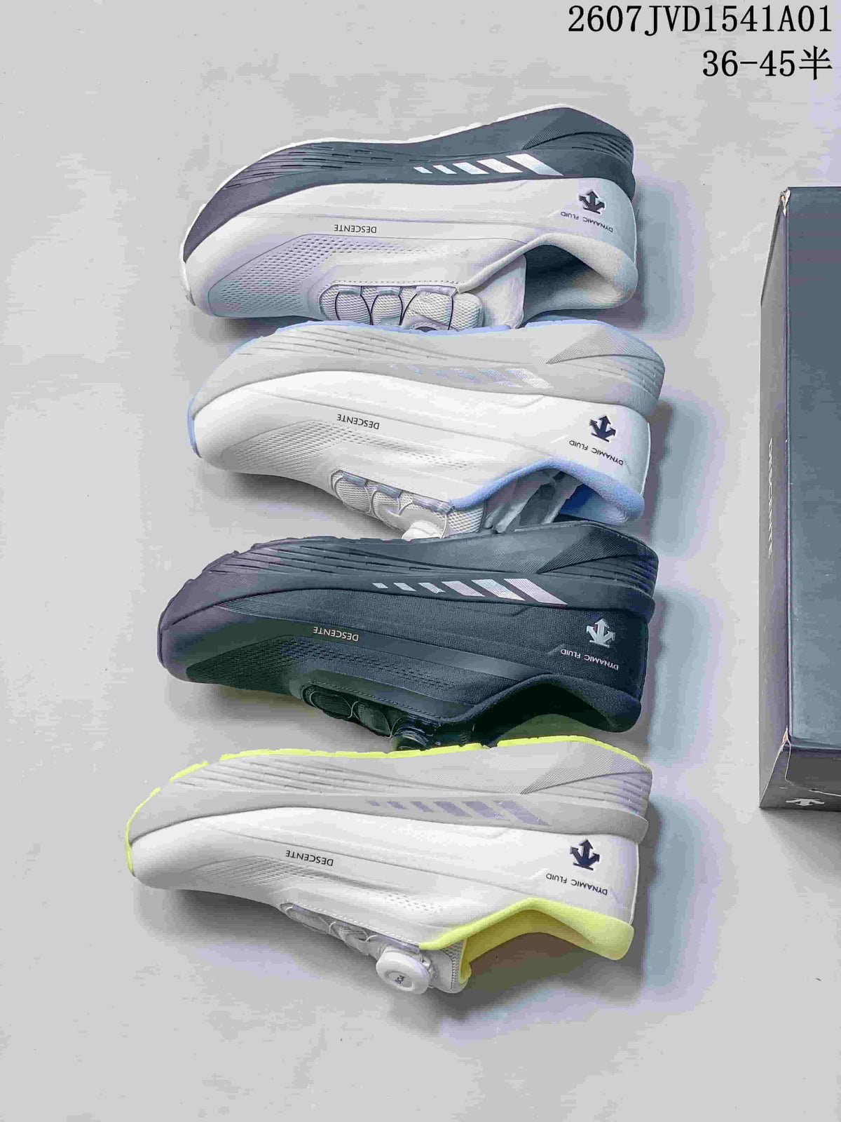 Four Descente running shoe color combinations shown in profile.