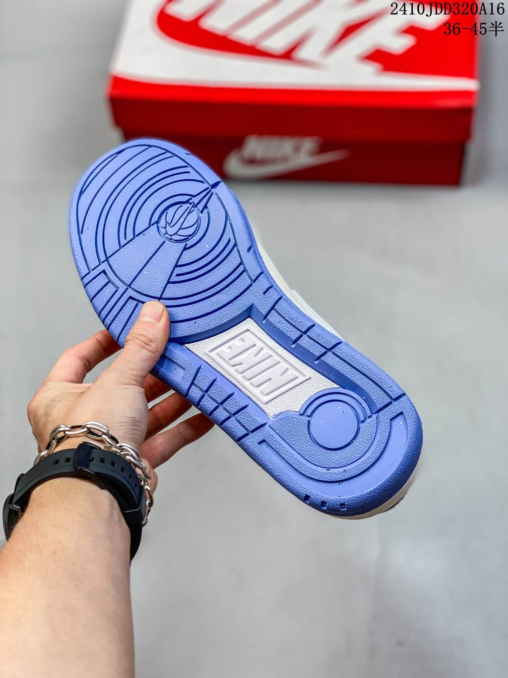 Blue rubber outsole of the Nike Full Force LO sneaker with circular tread details and a central molded panel.