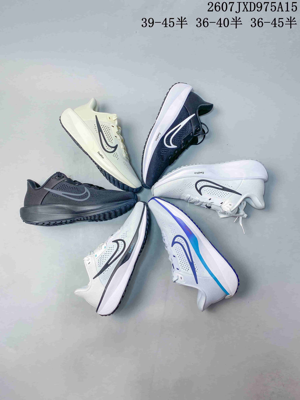 Multiple Nike Quest 6 low-top sneakers arranged in white, black, gray, blue and pink-accented colorways.