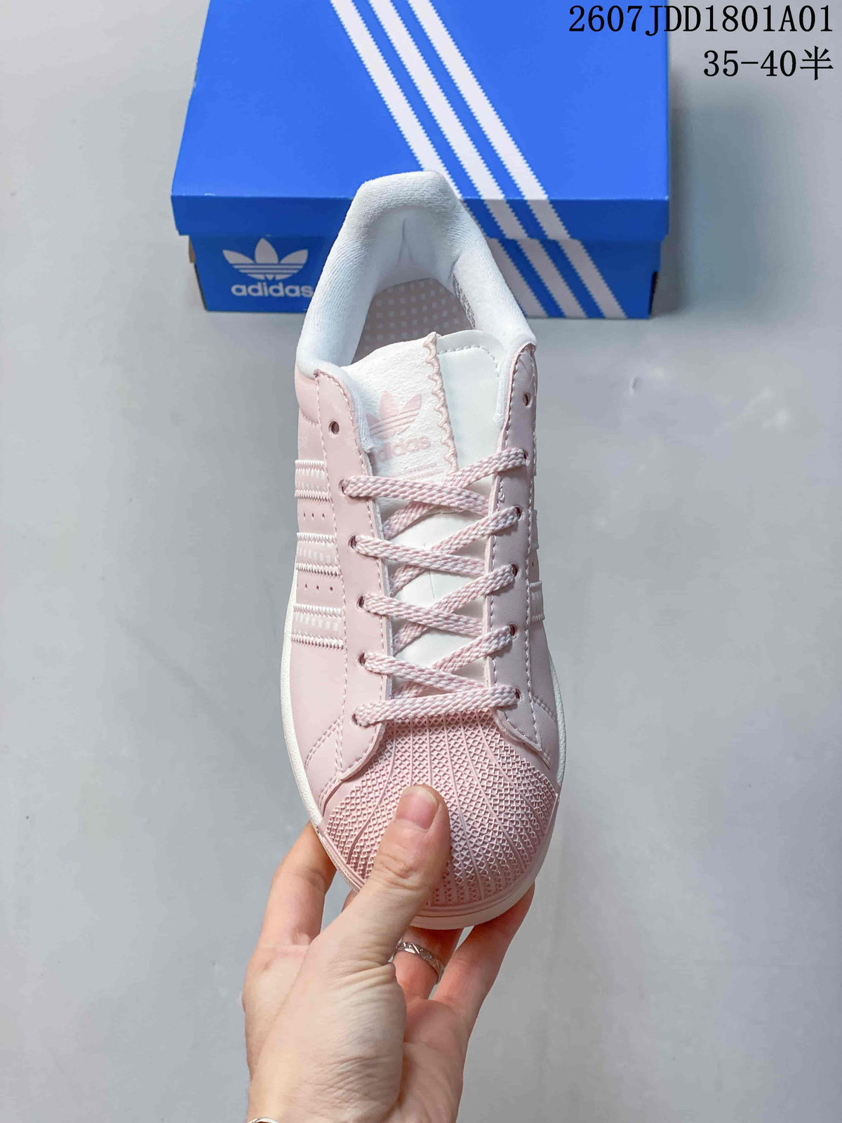 Front view showing the lace-up upper and textured shell-style toe
