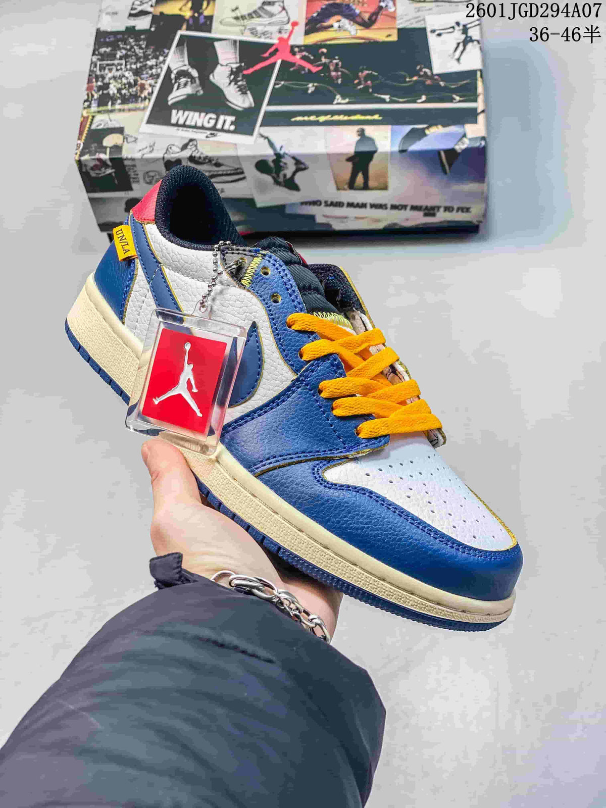 Close view of a blue and white low-top sneaker with yellow laces