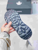 Close view of the sneaker outsole showing a deep, geometric tread pattern; overlay text shows 2607GDD847A27 and size range 38–44.