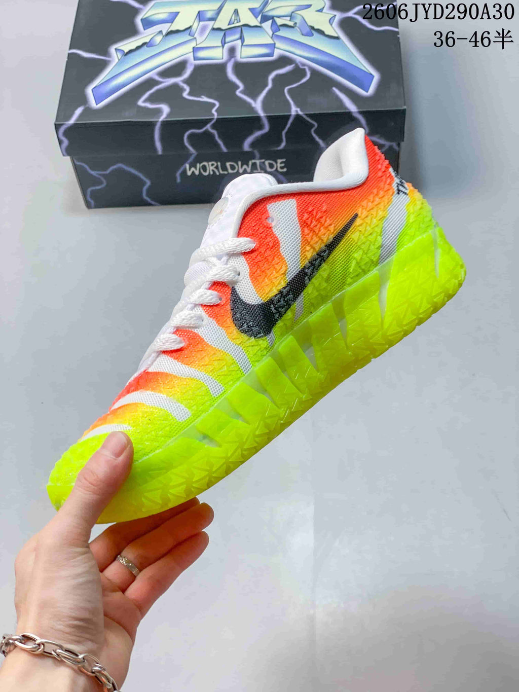 Side view of a Nike Ja 3 basketball shoe showing its bright color blocking and textured outsole.