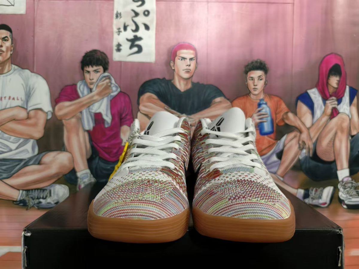 Front view showing white laces, multicolor patterned uppers and gum-colored outsoles