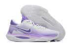 White and purple basketball shoe with a purple outsole and side detailing.