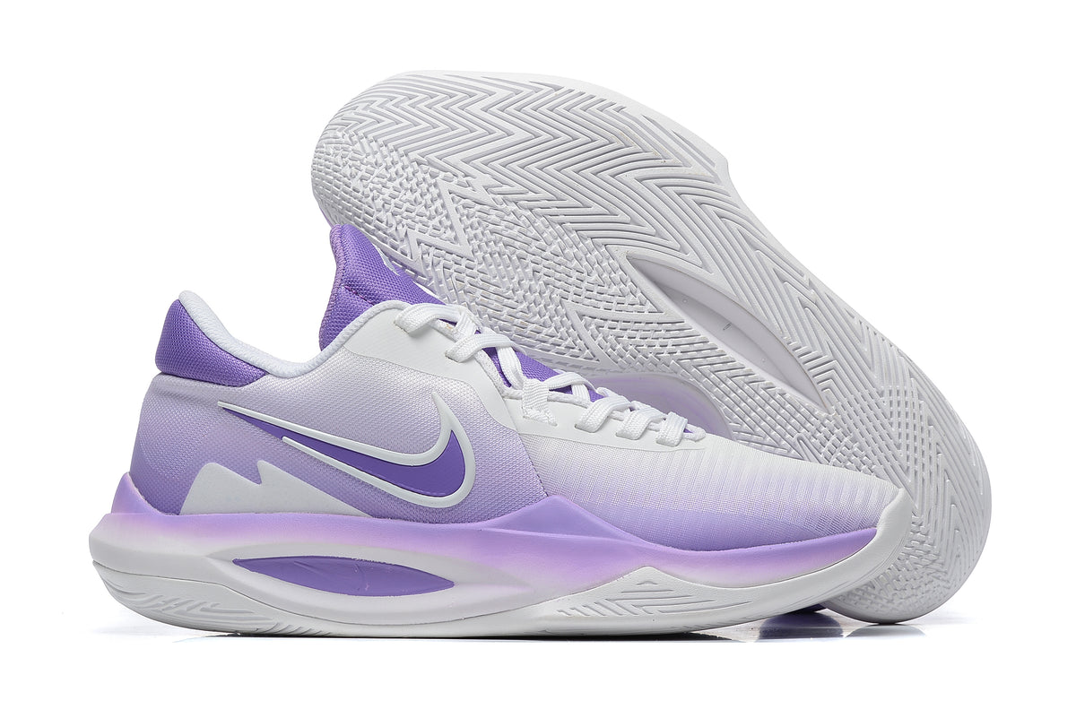 White and purple basketball shoe with a purple outsole and side detailing.
