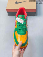 Front view showing the perforated yellow toe and green laces