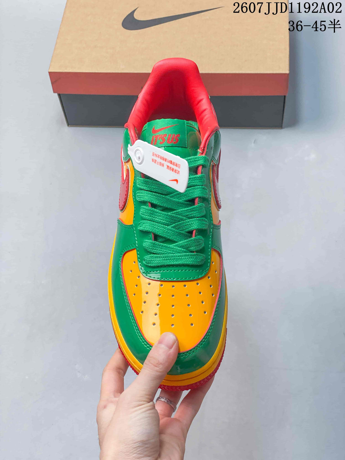 Front view showing the perforated yellow toe and green laces