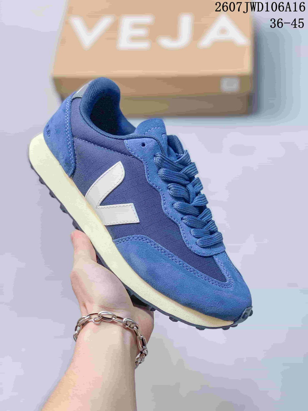 Blue VEJA Rio Branco sneaker with a light V logo, textured panels and cream-colored midsole.