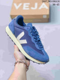 Blue VEJA Rio Branco sneaker with a light V logo, textured panels and cream-colored midsole.