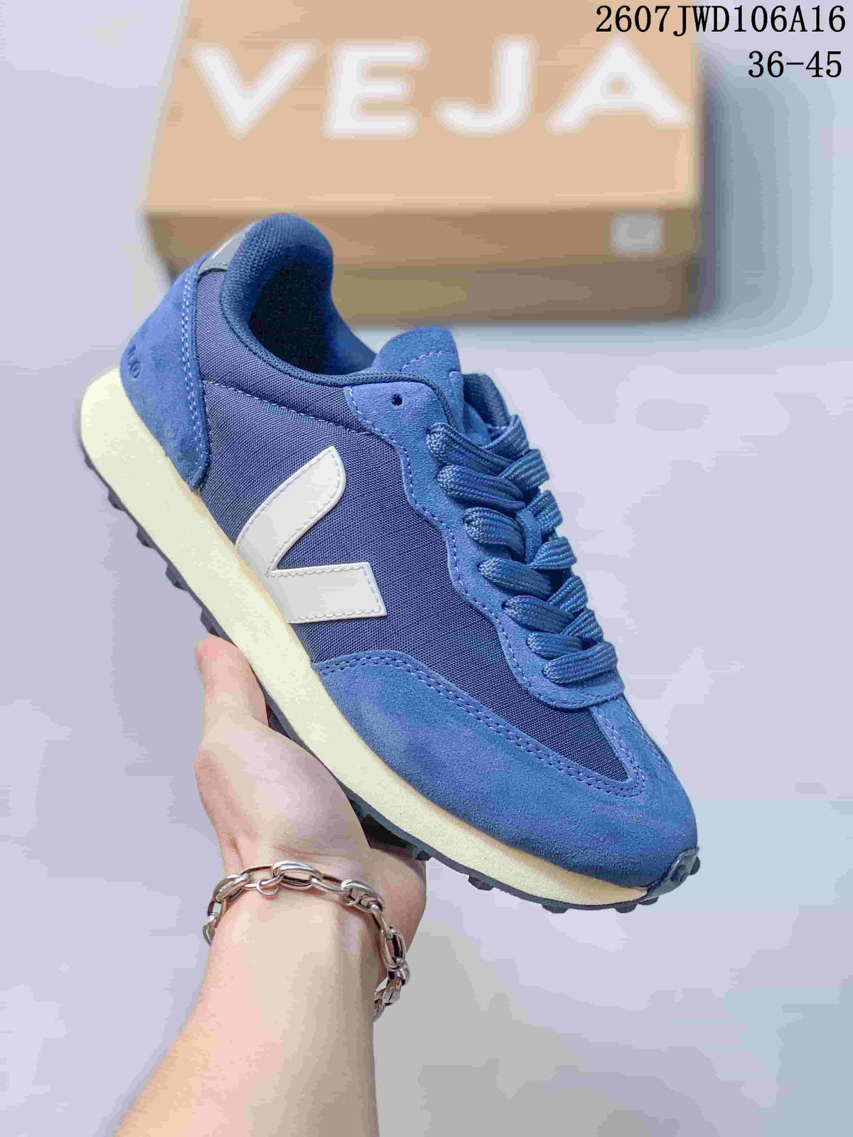 Blue VEJA Rio Branco sneaker with a light V logo, textured panels and cream-colored midsole.