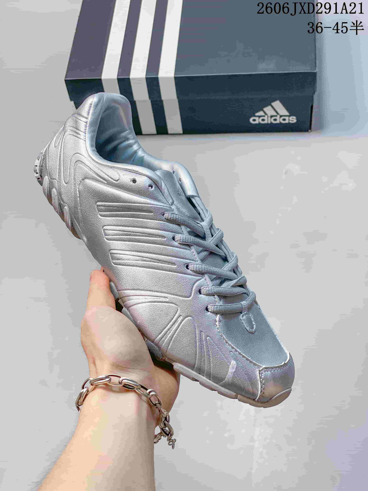 Silver adidas Ghost Sprint sneaker shown close up with reflective-looking panels and a light outsole.