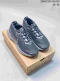 Pair of dark gray Nike Pegasus Trail 5 GORE-TEX trail running shoes on a box