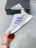 Side view showing the white mesh upper, three lilac stripes, layered overlays, and raised sole.