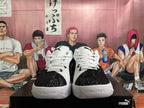 Front view showing the black patterned toe, white laces and white sole