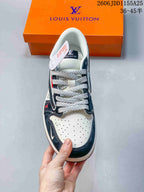 Top view showing the perforated light toe box, dark edging and braided laces.