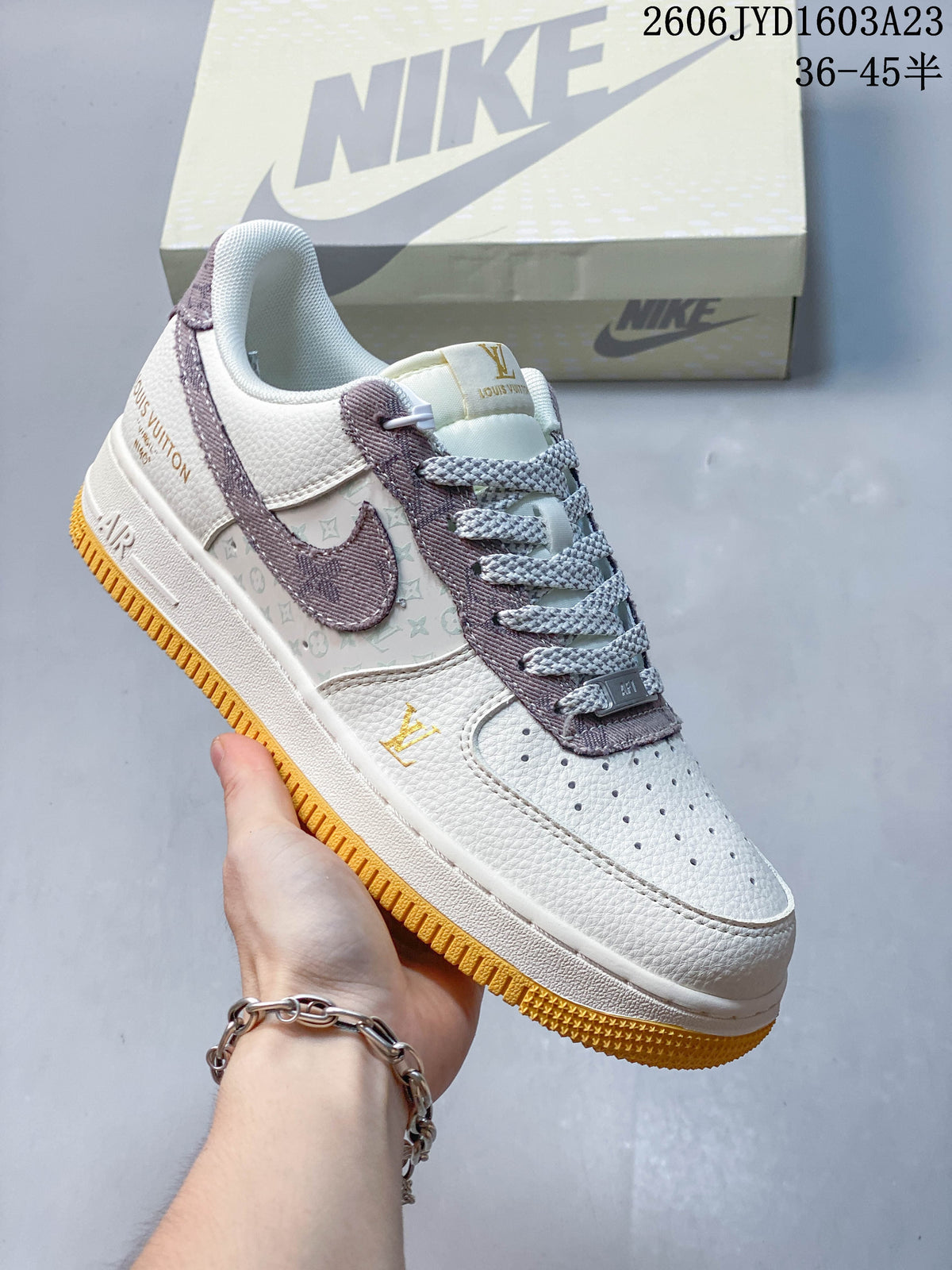 Angled side view highlighting the patterned panel, mauve Swoosh, and gum-yellow outsole.