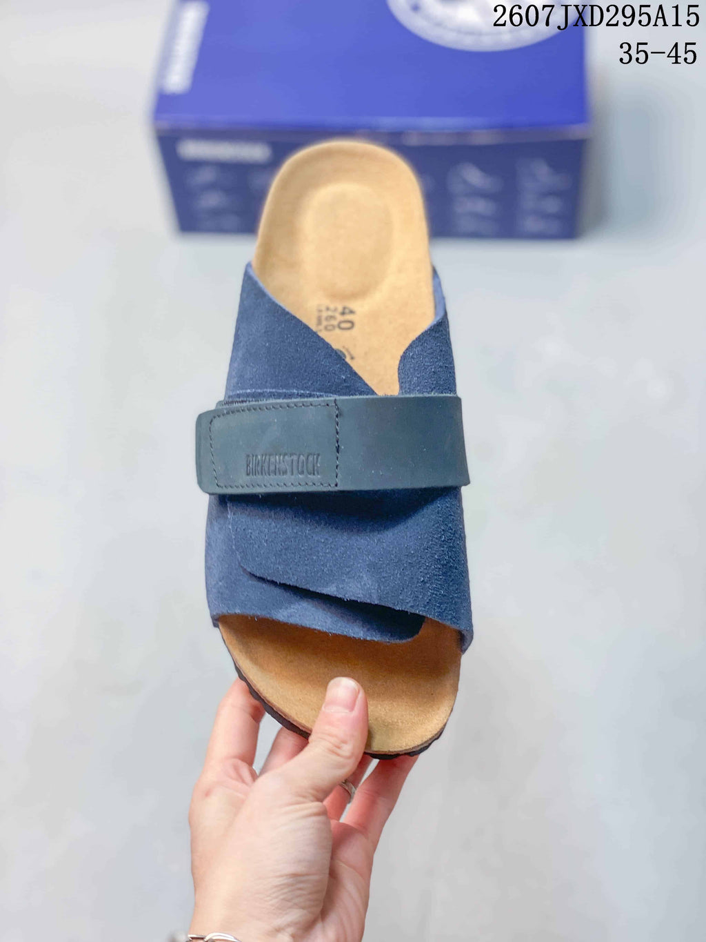 Top view of a navy sandal showing the open toe, adjustable strap, footbed, and visible EU 40 marking.