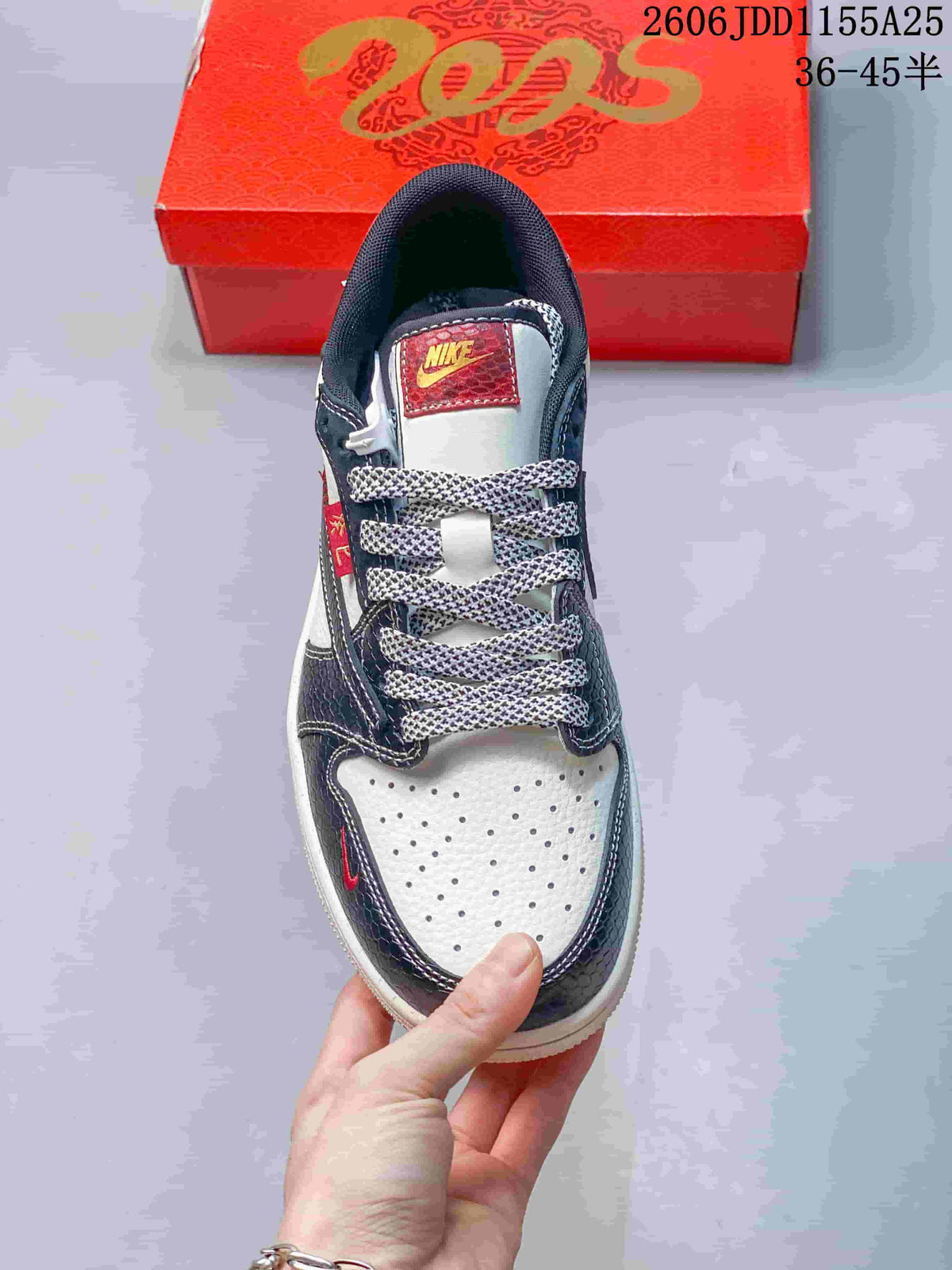 Top view showing the perforated white toe box, patterned dark overlays and contrast laces.