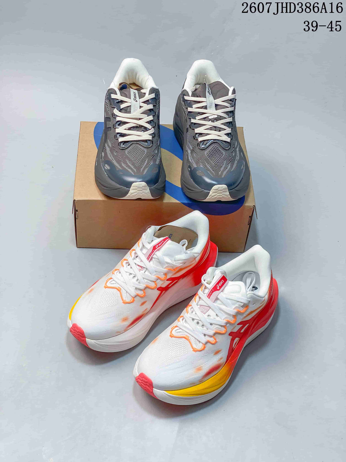 Two ASICS colorways shown together: gray and navy, plus white with red, orange, and yellow accents.