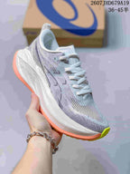Angled side view of a gray and white ASICS Superblast 2 Paris running shoe with coral and lime outsole accents.
