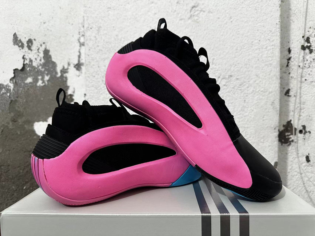 Pair of black and pink sneakers displayed in overlapping side views.