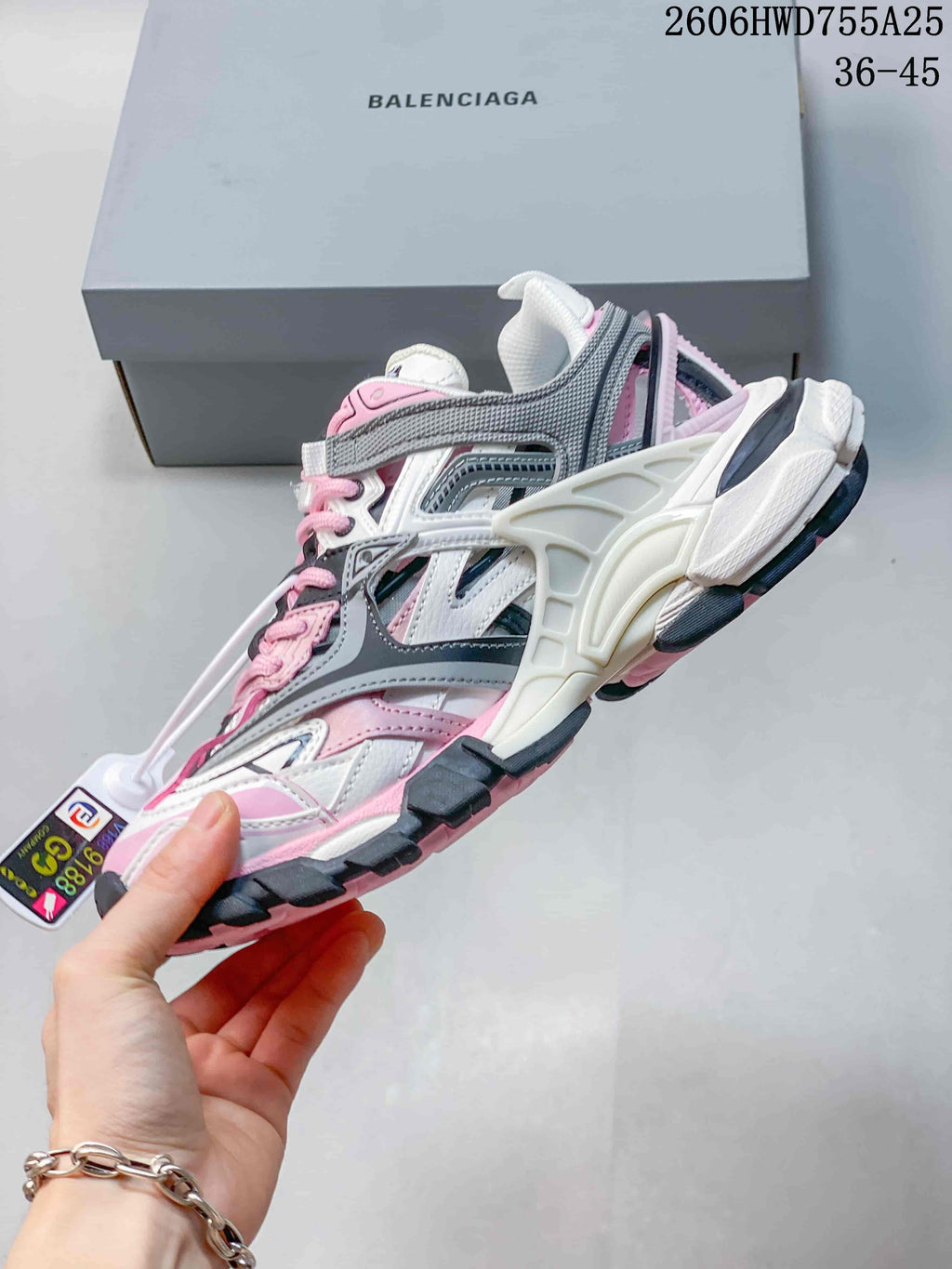 Side view highlighting the layered overlays and chunky sole of a Balenciaga Track 2 sneaker; an image overlay shows a 36–45 size range.