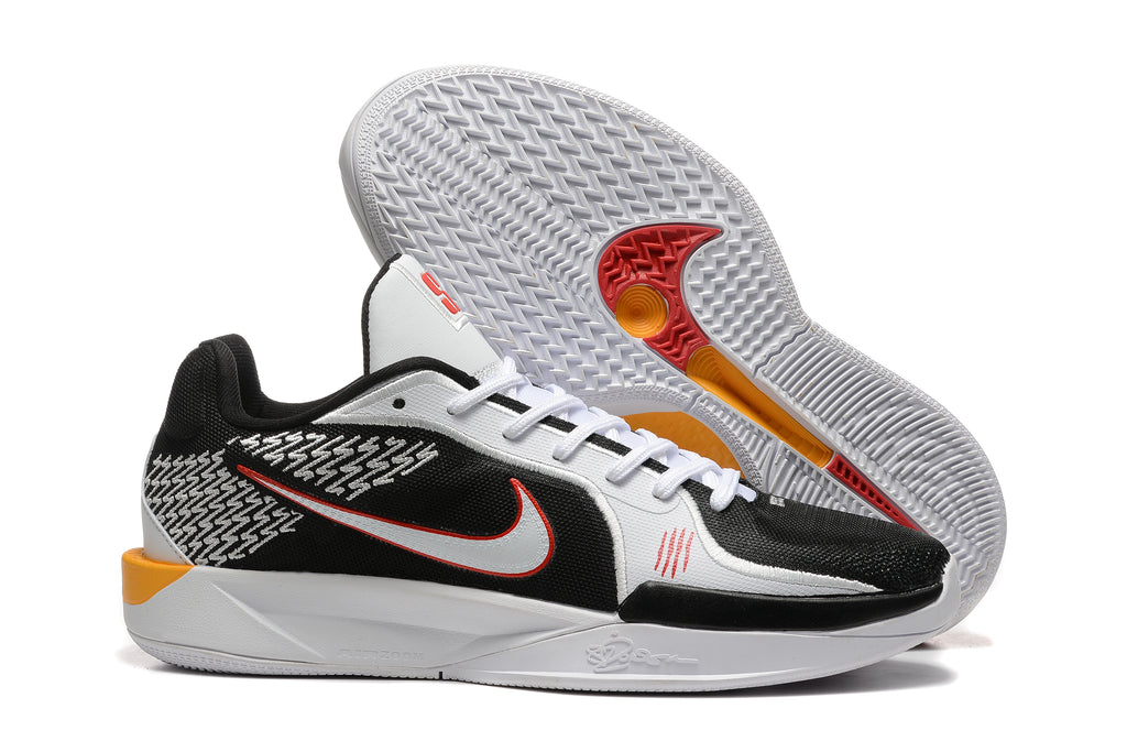 Basketball shoes shown with the textured outsole visible