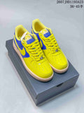 Pair of yellow and blue Nike Air Force 1 '07 low-top sneakers displayed on a shoebox.