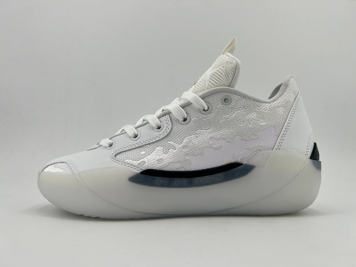 Side view of a white lace-up sneaker with a textured upper, layered side detail, and sculpted sole