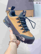 Tan and dark gray low-top The North Face Glenclyffe shoe with lugged outsole.