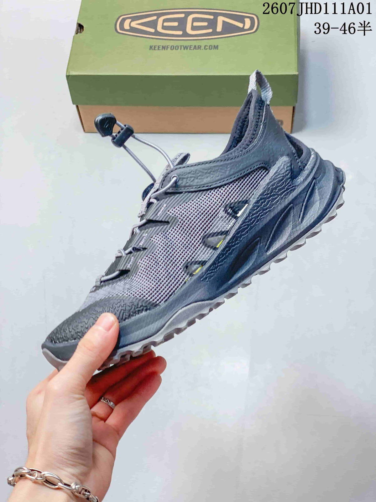 Side view of a gray Keen Zionic ADV low-top hiking shoe