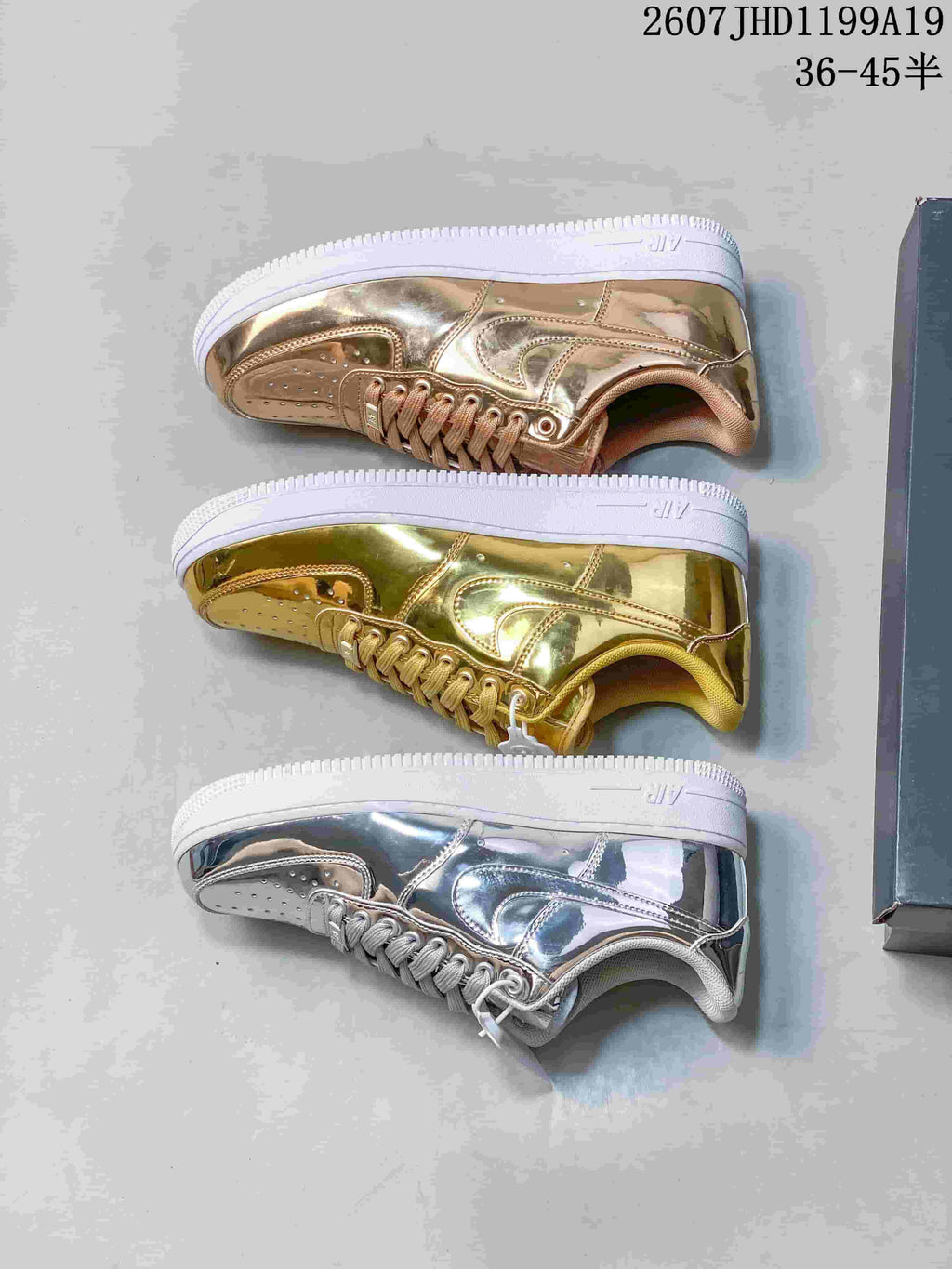 Three low-top sneakers shown in metallic gold, bronze-gold, and silver colorways.