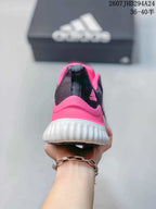 Rear view showing the pink heel panel, white midsole and adidas branding.