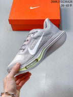Side view of the Nike Pegasus Plus shoe with a white Swoosh and visible midsole details.