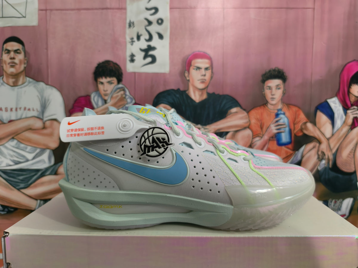 Side view showing the blue Nike Swoosh, perforated panels, and ZoomX lettering on the midsole