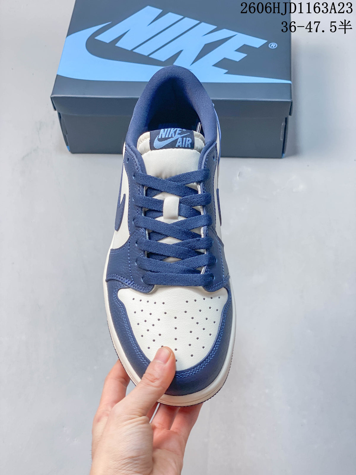 Top view showing the perforated toe and laces of a Jordan Air Jordan 1 Low sneaker