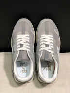 Top view showing the grey layered uppers, white laces, padded collars, and BAPE STA insoles.