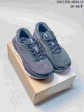 Pair of dark gray On Cloudsurfer 3 sneakers displayed on a shoe box, with style code and size range text visible above.