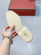 Underside of a loafer showing the sole and size 36 marking