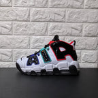 Opposite side view showing oversized AIR lettering on the white and black sneaker