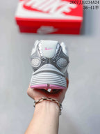 Rear view of a white and silver sneaker with pink outsole accents; overlay shows style code 2607JJD234A24 and sizes 36–41.5.