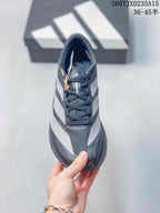 Top view showing the laces, padded collar, dark upper, and white side accents.