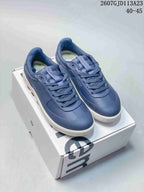 Pair of navy lululemon Cityverse low-top sneakers with matching laces and white outsoles displayed on a shoebox; image text shows style code 2607GJD113A23 and size range 40–45.