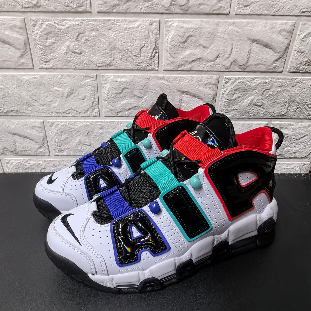Pair of sneakers viewed from the front quarter, showing perforated panels and colorful accents