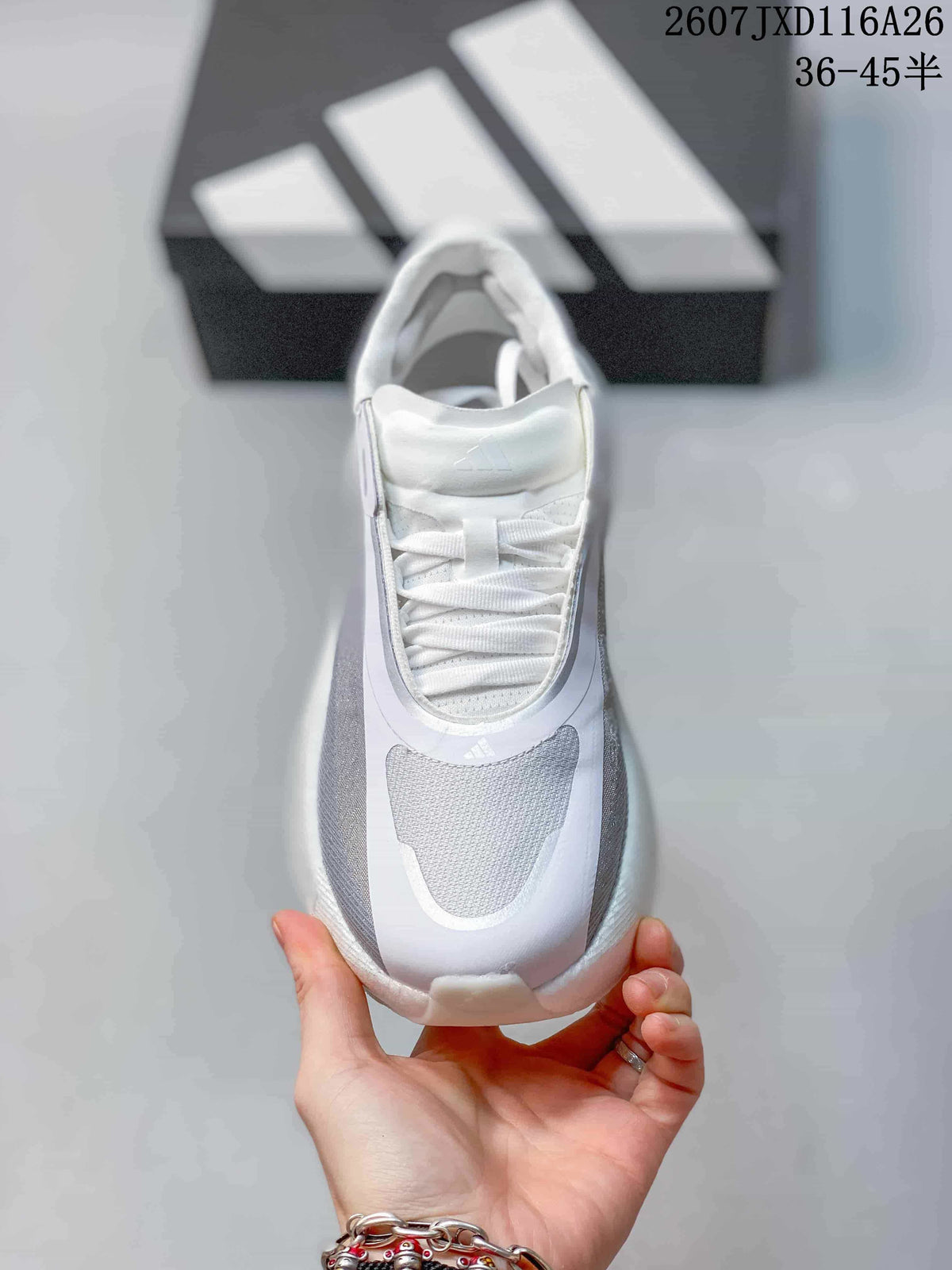 Top view showing the white laces, padded tongue and grey toe-panel details.