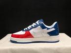 Side profile highlighting the white star-shaped side motif and blue outsole edge.